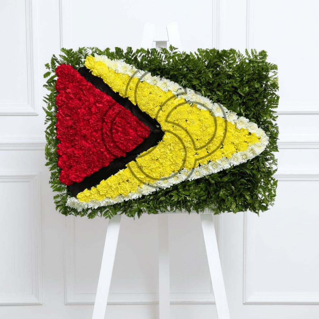 Guyana flag floral arrangement on a thick white easel with wainscoting background