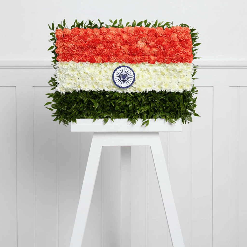 India flag floral arrangement on a thick white easel with wainscoting background